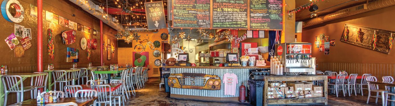 Daphne Taco Mama Cuts Ribbon