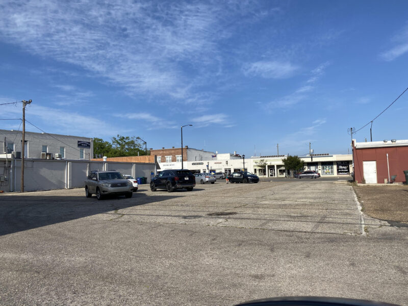 FOLEY TO BUY PARKING LOT AT HIGHWAYS 59 AND 98