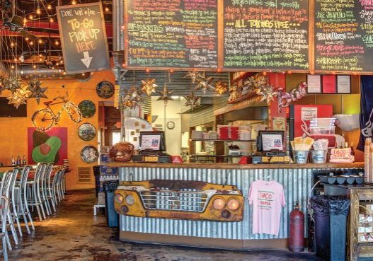 Daphne Taco Mama Cuts Ribbon