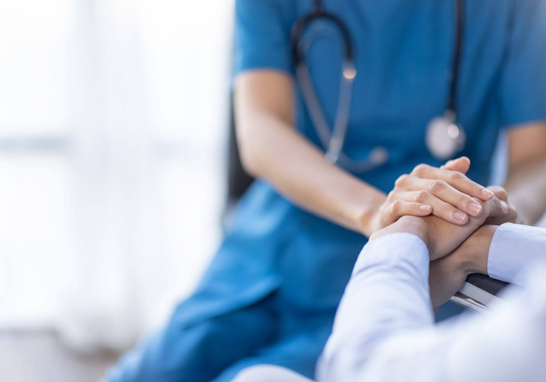 Cropped,Shot,Of,A,Female,Nurse,Hold,Her,Senior,Patient's